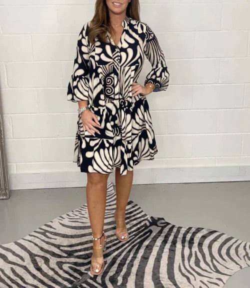 Erika - Bohemian dress with V-neckline and floral pattern