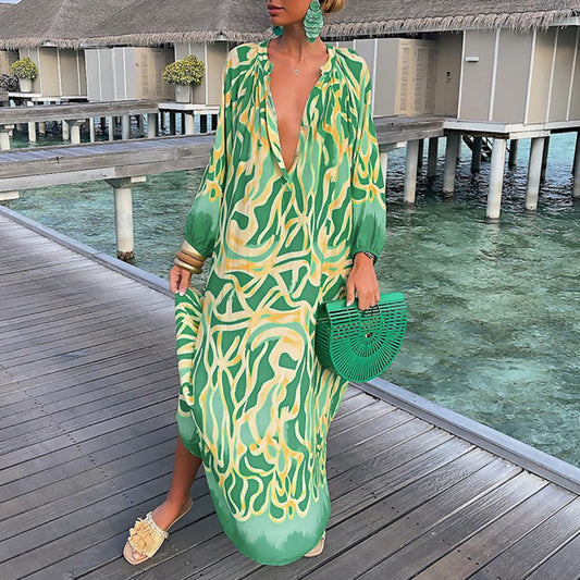 Biarritz - Maxi dress with long sleeves and a deep V-shaped neckline