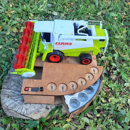 Green-Maxi : distributeur automatique de shots au design de moissonneuse-batteuse