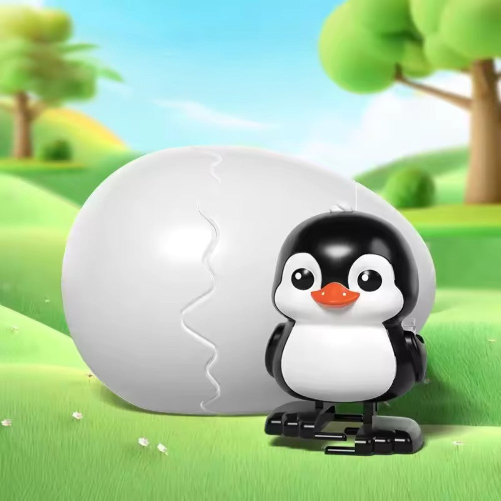 Œuf surprise avec petit animal dansant