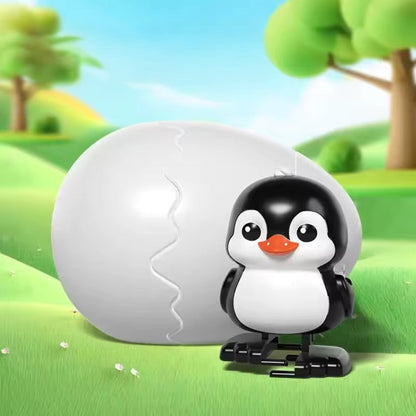 Œuf surprise avec petit animal dansant