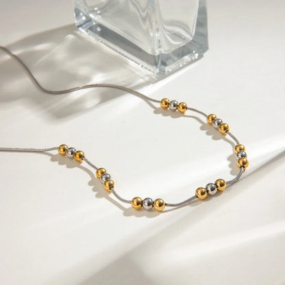 Zora Gold Silver Ball Necklace