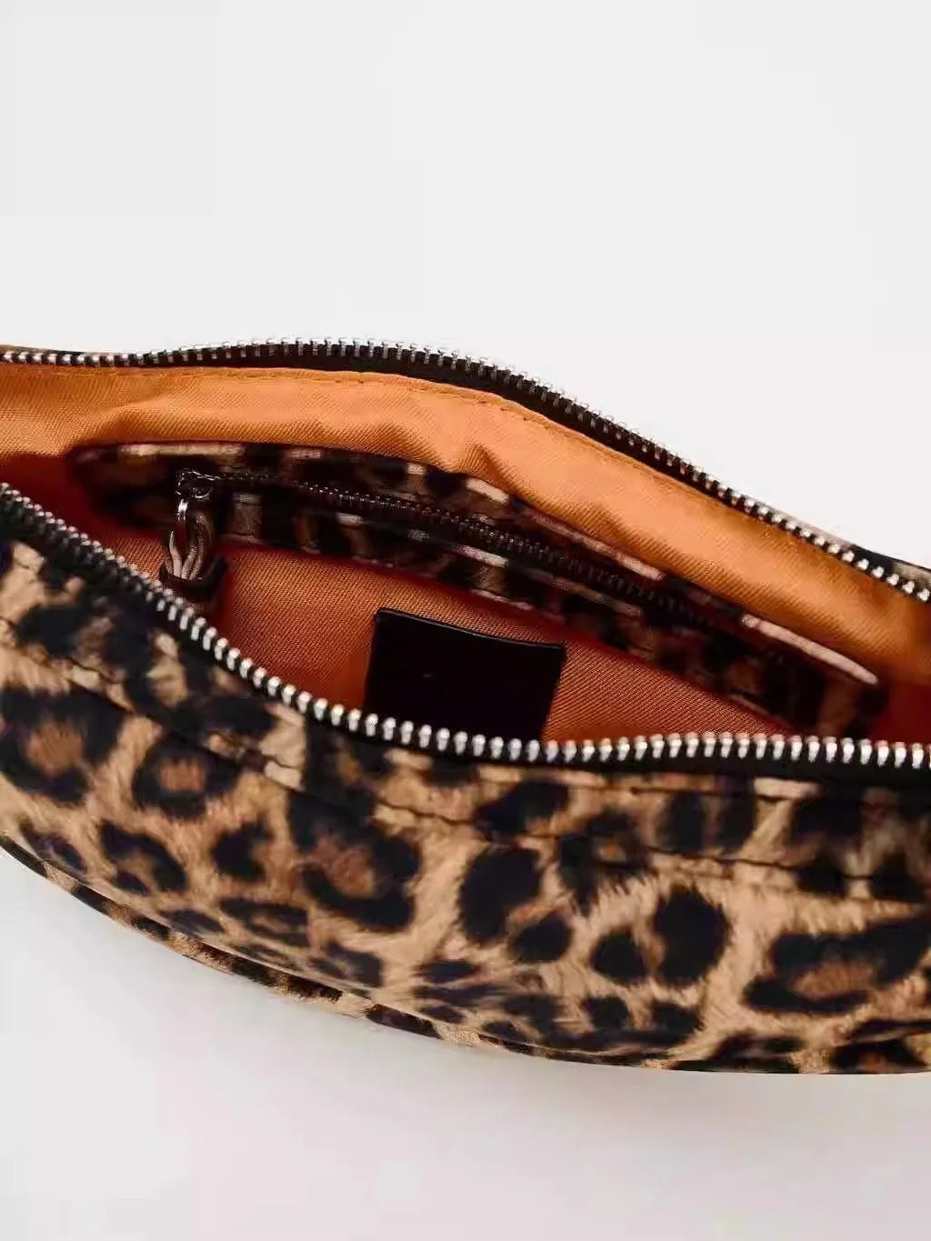 Lupa Wildside Sling Leopard Bag