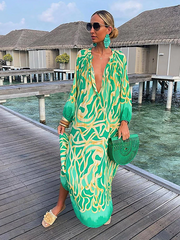Biarritz - Maxi dress with long sleeves and a deep V-shaped neckline